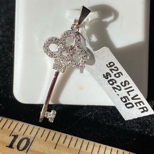 Silver and crystal key pendant